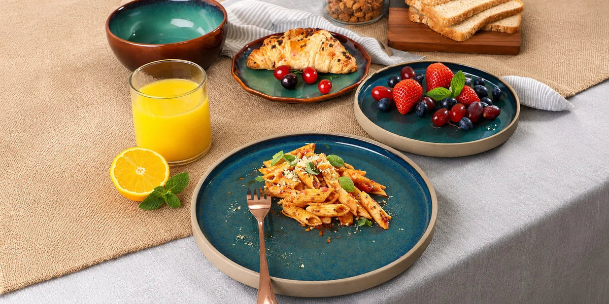 A British summer table set with hand-thrown ceramic plates