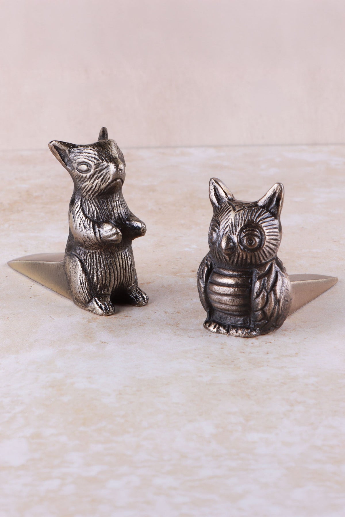 Owl and squirrel door stoppers together, antique brass