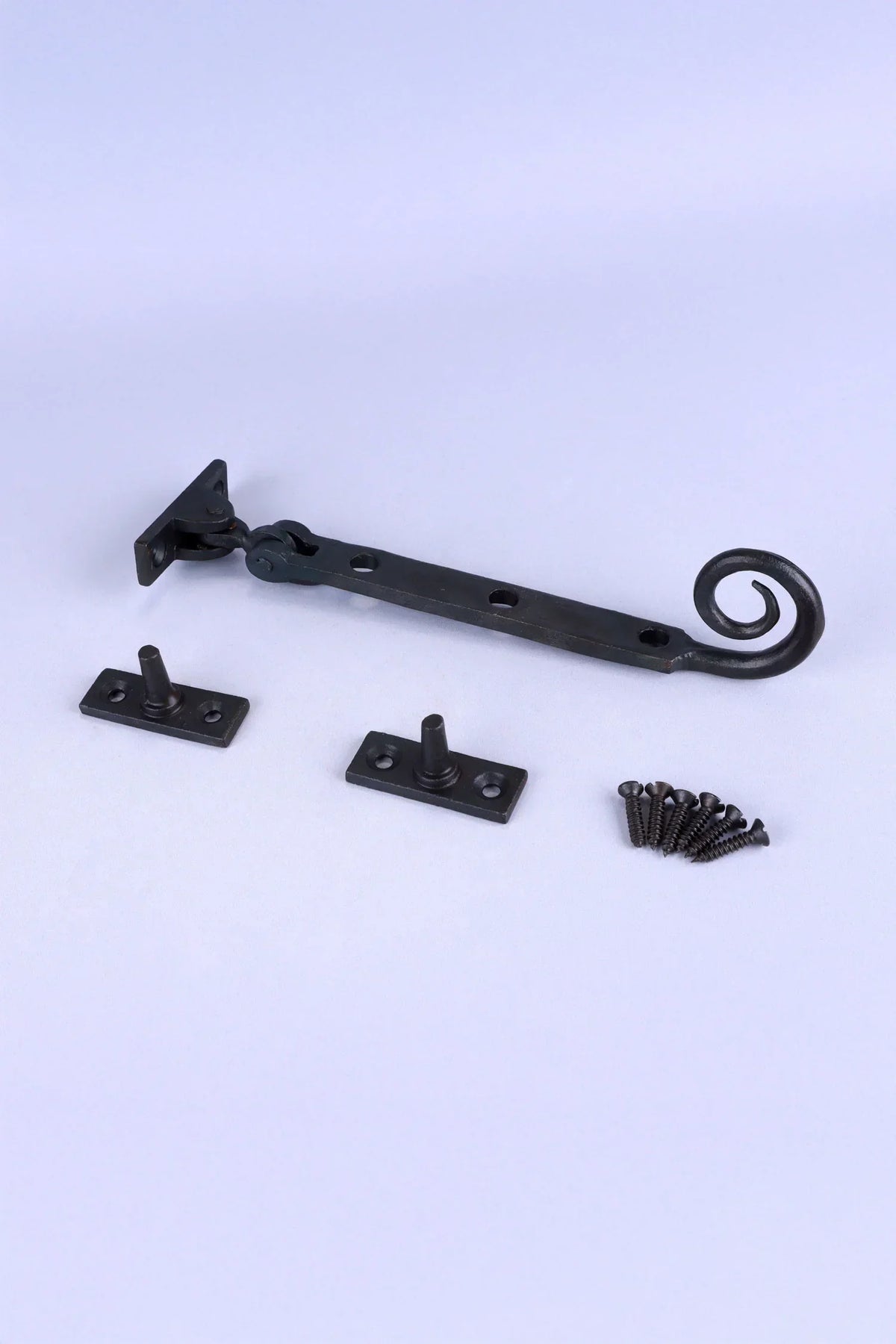 Hand-Forged Monkey Tail Window Stay, Beeswax — lifestyle view, G Decor