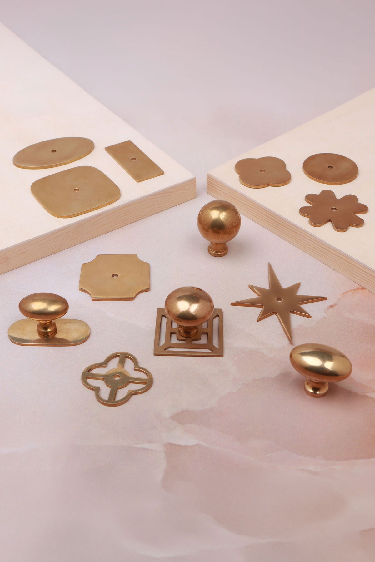 Cabinet knobs and backplates in aged brass