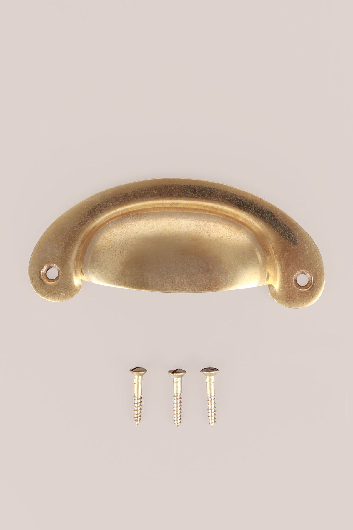 Slim crescent cup pull in aged brass
