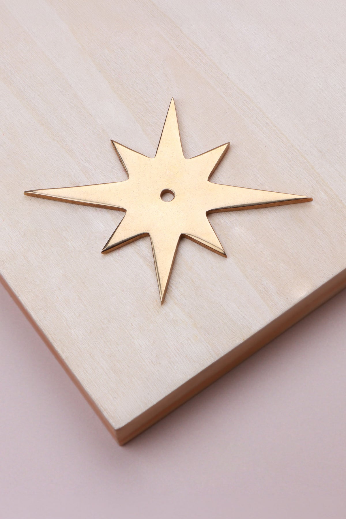 Aged brass star backplate, 87 x 68mm: solid brass with a 4mm centre hole for the knob bolt