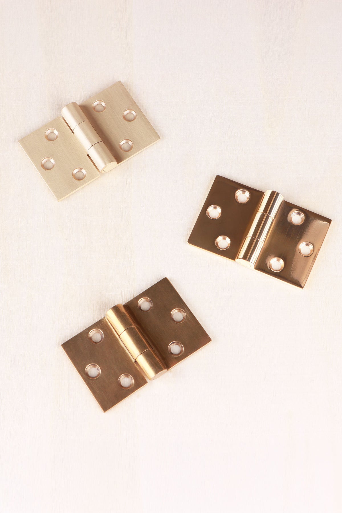 Backflap hinge in polished, aged and satin brass, second view