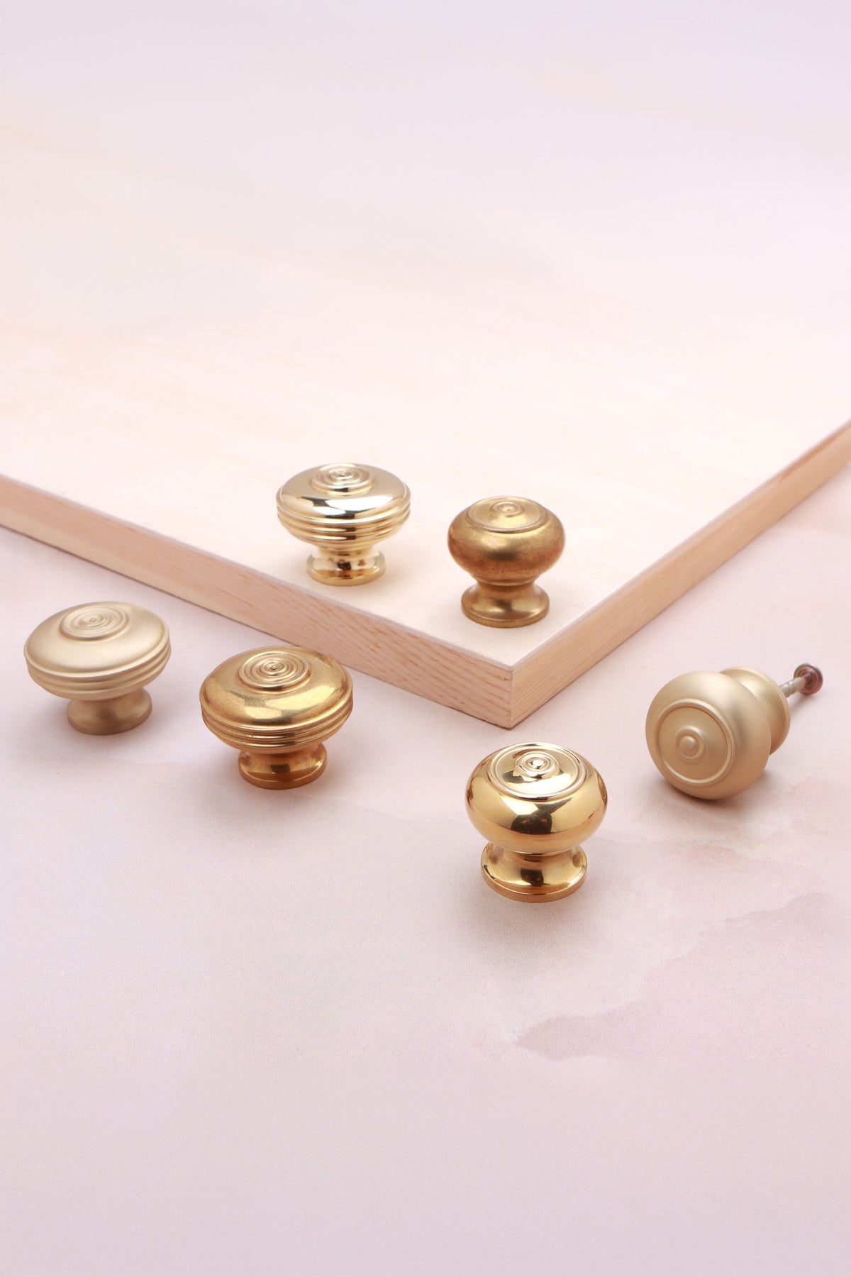 Bloxwich cabinet knob in polished, aged and satin brass, third view