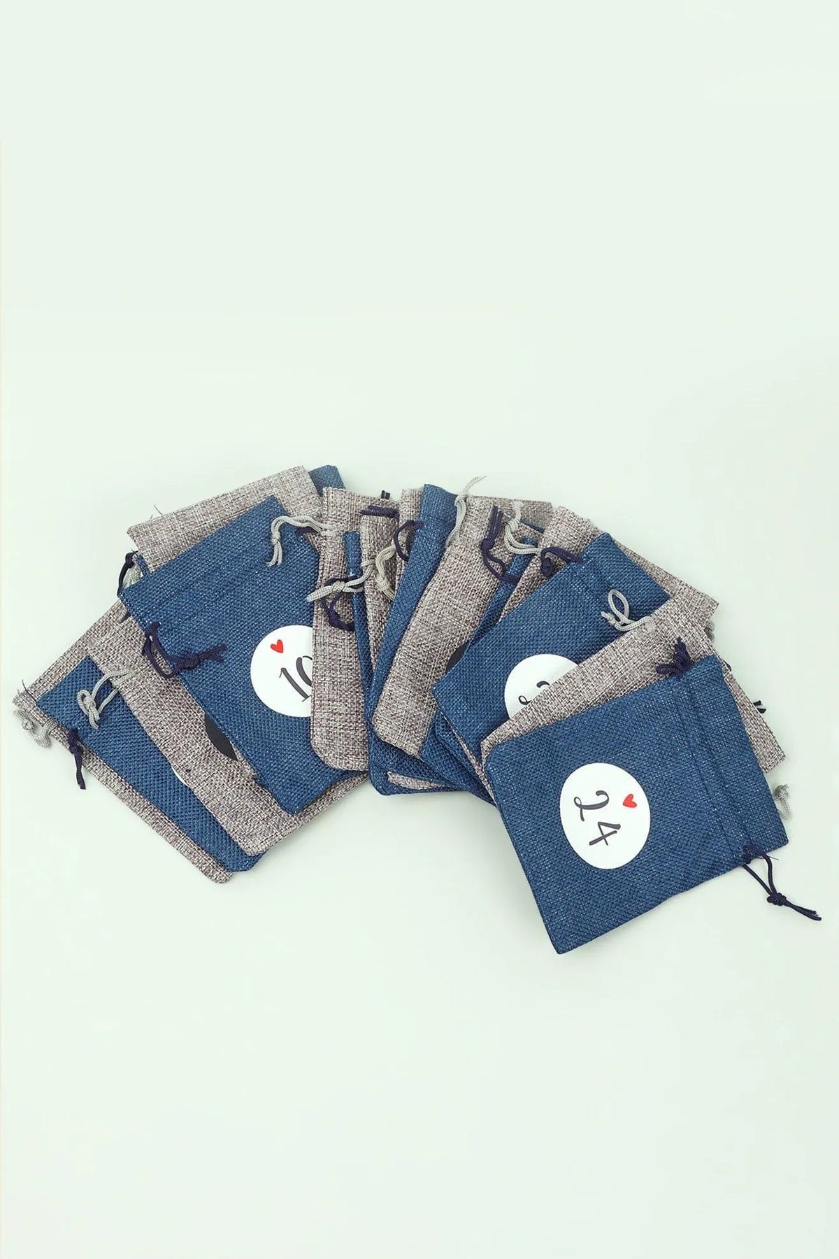 Blue and Grey Cloth Reusable Advent Calendar Bags — lifestyle view, G Decor