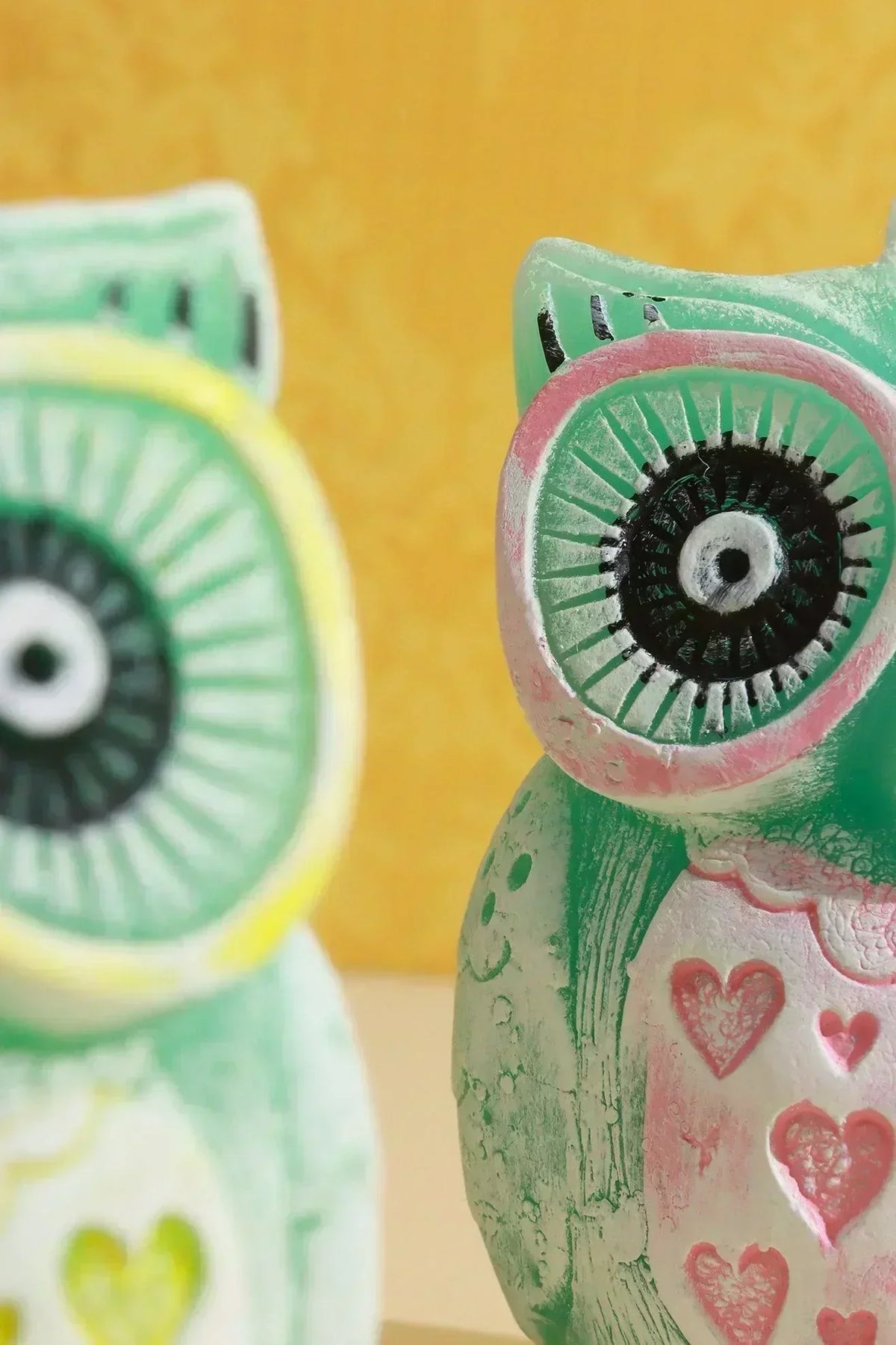 Hootique Owl Couple Candle in Pink and Yellow — close-up view, G Decor