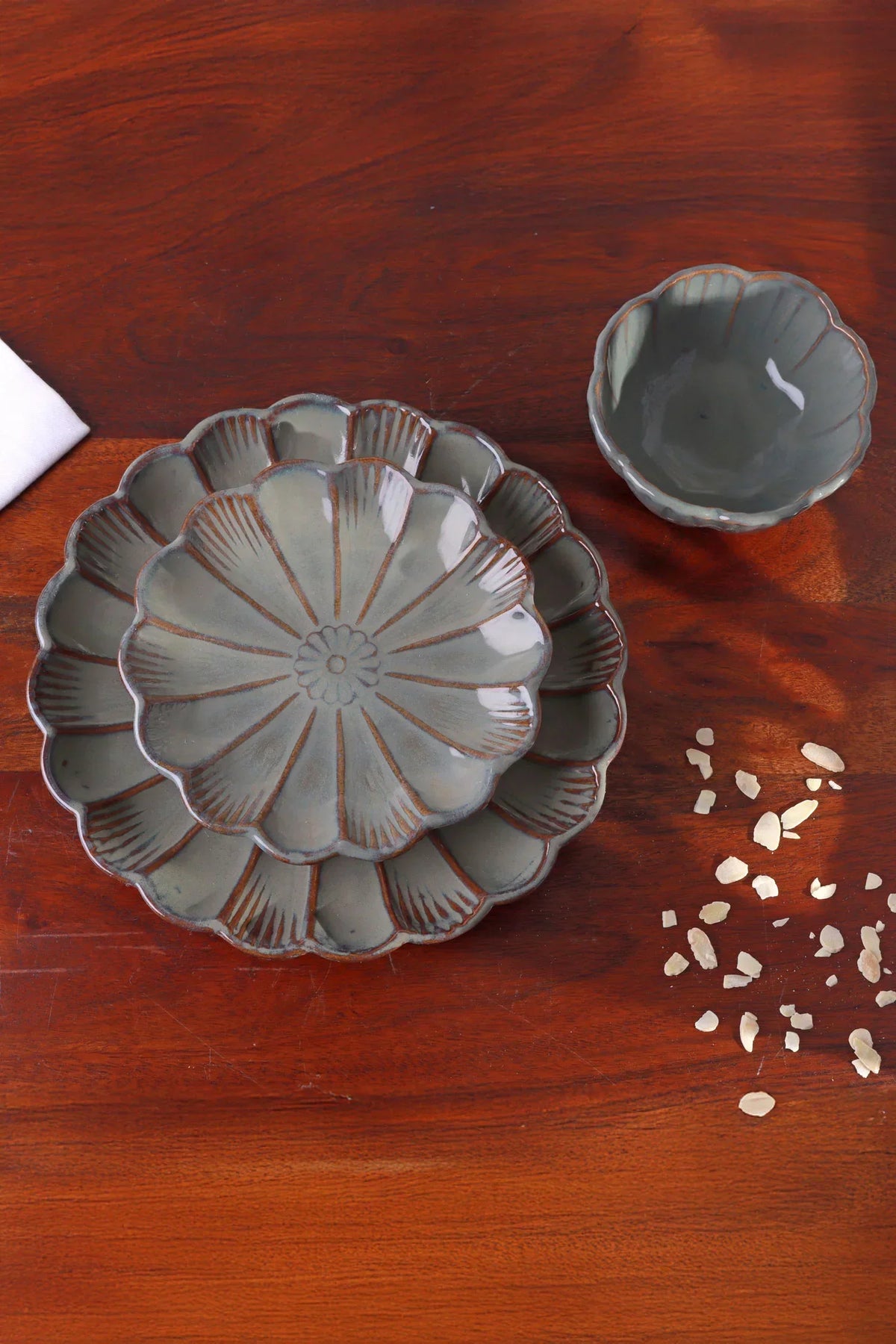 Petal Bloom Floral Carved Stoneware Plates and Bowls — close-up view, G Decor