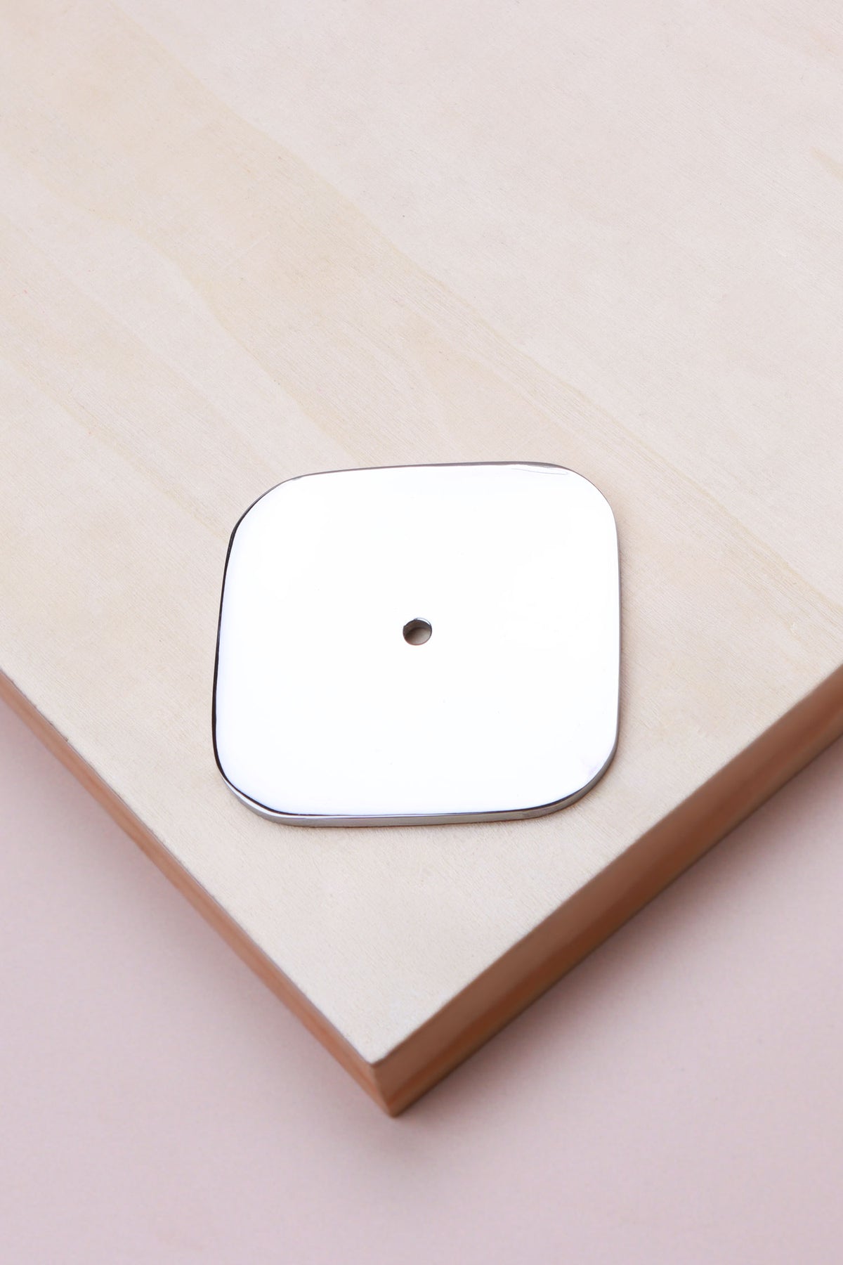 Polished chrome squircle backplate, 60 x 60mm with softly rounded sides: chrome-plated solid brass with a 4mm centre hole for the knob bolt