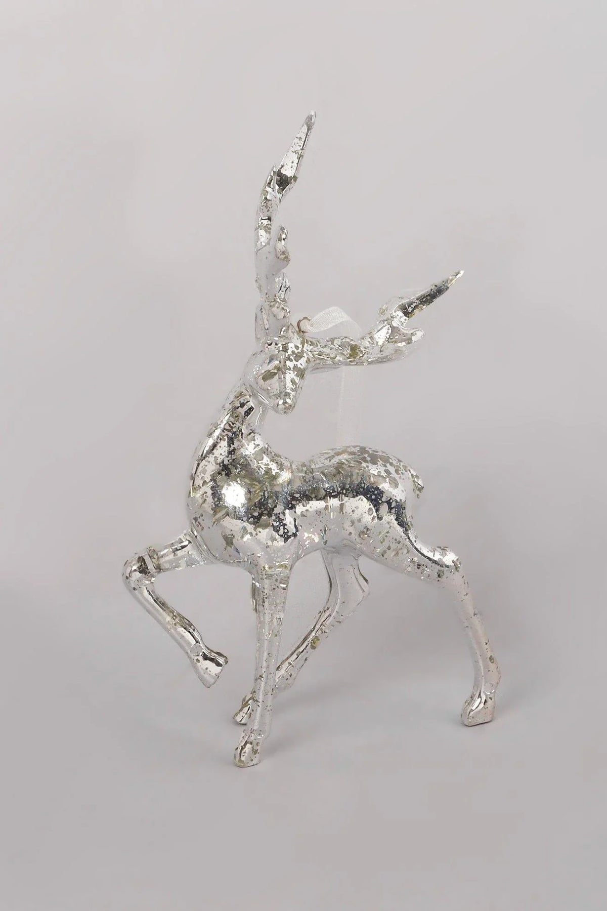 Silver mottled glass reindeer styled together — lifestyle view, G Decor
