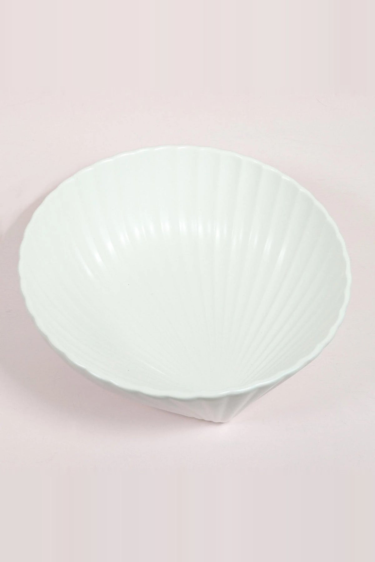 Deep white porcelain shell bowl with fine ridges inside