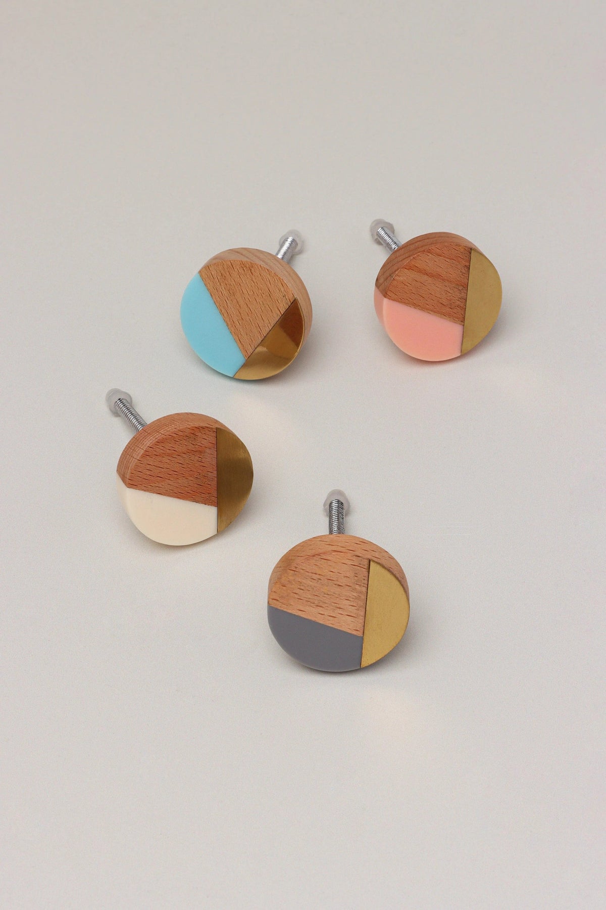 Brass vs chrome cabinet knobs — three-tone wood, resin and brass cabinet knob showing warm metal detail | G Decor