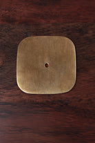 Squircle aged brass backplate rosette, a rounded square, 60 by 60mm