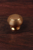 Beehive aged brass cabinet knob, reeded with flat top, 32mm