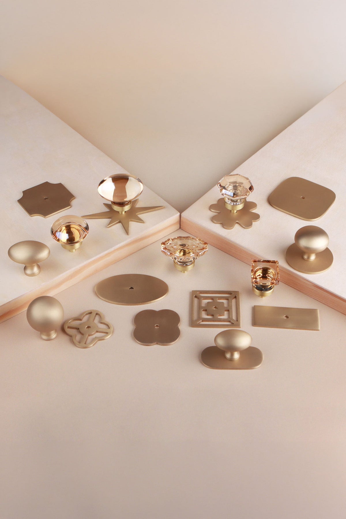Champagne crystal glass knobs and satin brass knobs styled with brass backplates to mix and match