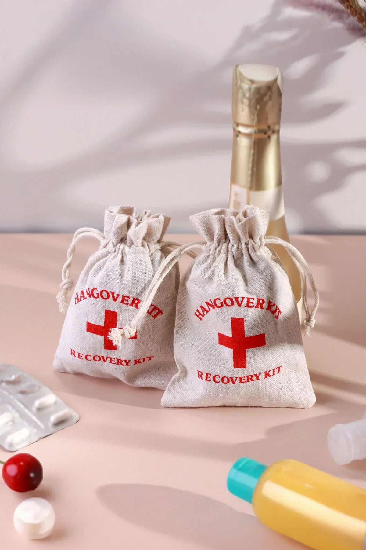 Pair of Hangover Kit Linen Gift Bags with Red Cross Design — G Decor