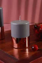 Ceraven Glass-Effect Pillar Candle in Grey and Brushed Copper — lifestyle view, G Decor