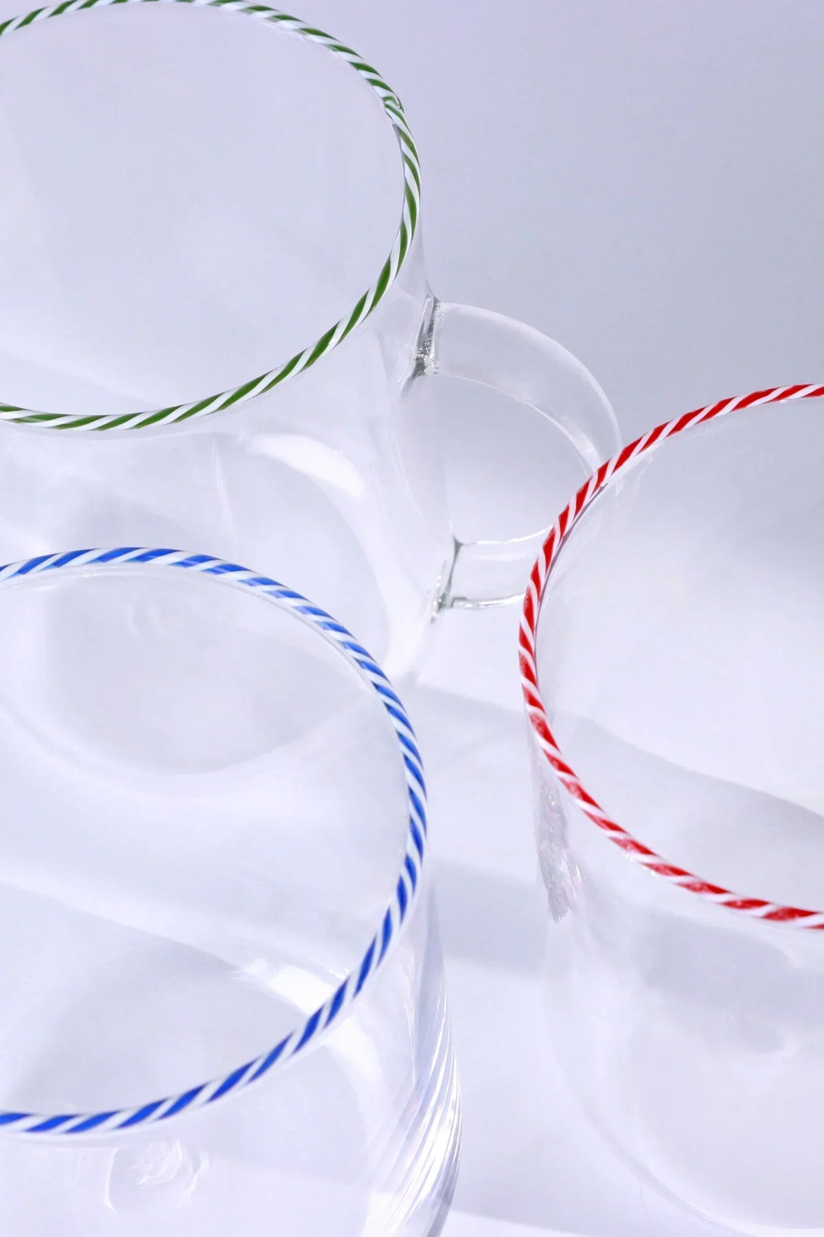 Twist Rim Glassware Tea and Coffee Mugs in Red Blue and Green — close-up view, G Decor
