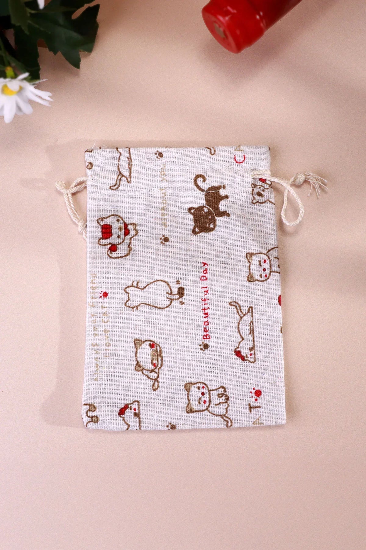Set of 2 or 4 Whisker Mischief Linen Gift Bag Pouches — lifestyle view, G Decor