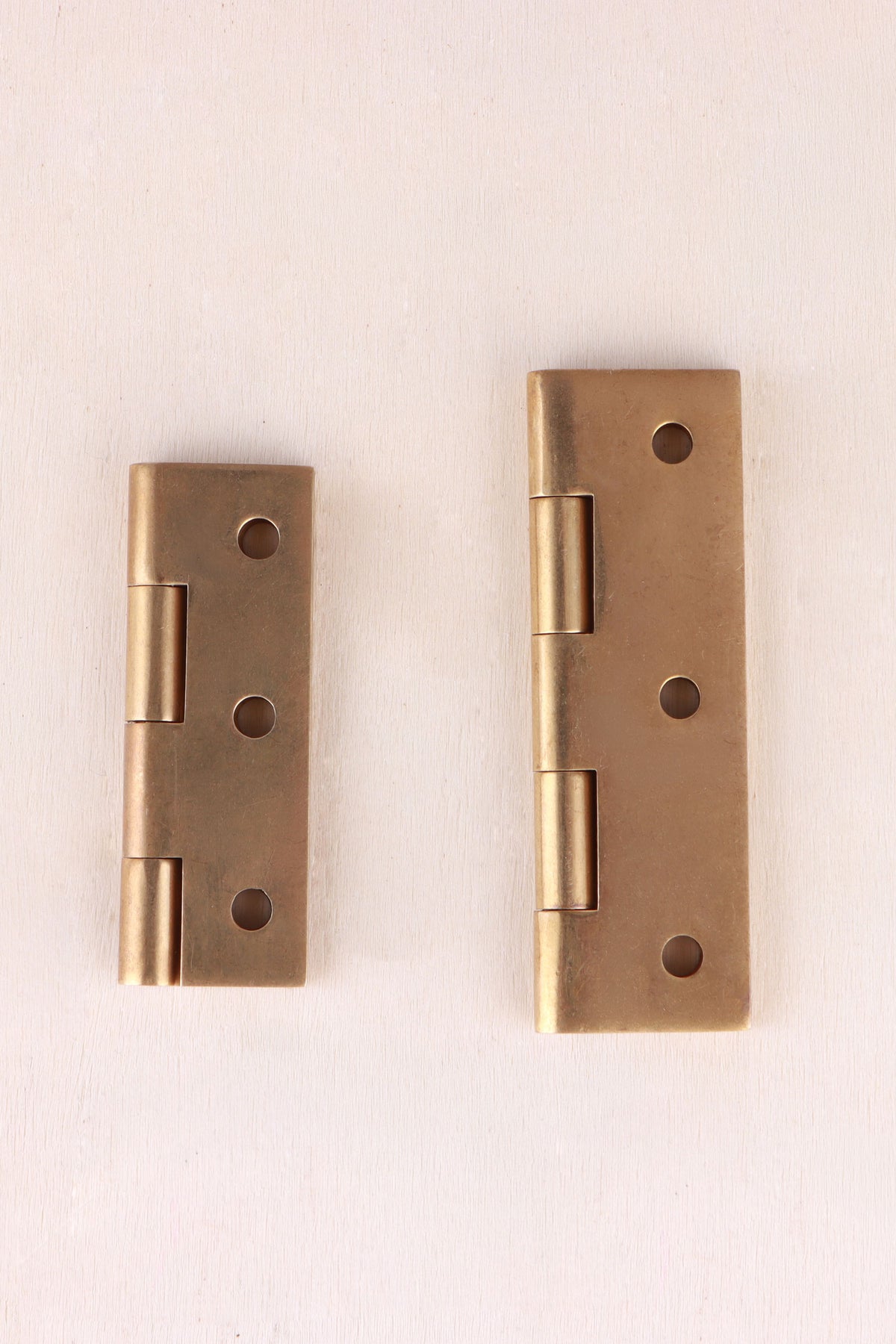 Butt hinge in aged brass, third view