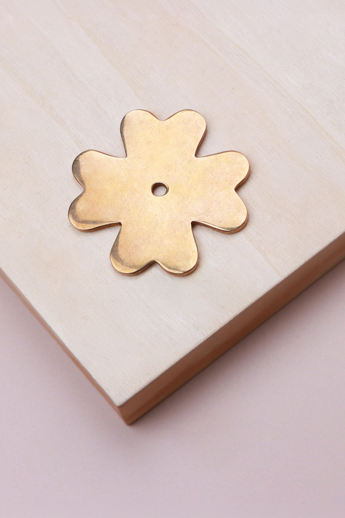 Aged brass flower backplate, 51 x 51mm: solid brass with a 4mm centre hole for the knob bolt