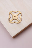 Aged brass pierced backplate, 38 x 38mm, an open quatrefoil: solid brass with a 4mm centre hole for the knob bolt