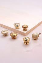 Bloxwich cabinet knob in polished, aged and satin brass, third view