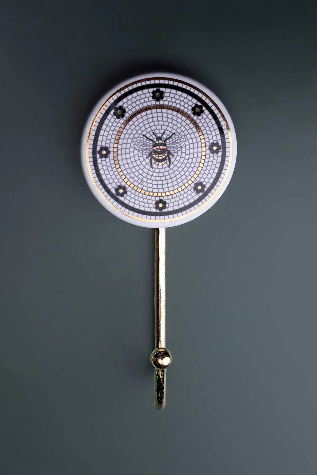 British Bee Tile Wall Hook in Black White and Gold with Brass — close-up view, G Decor