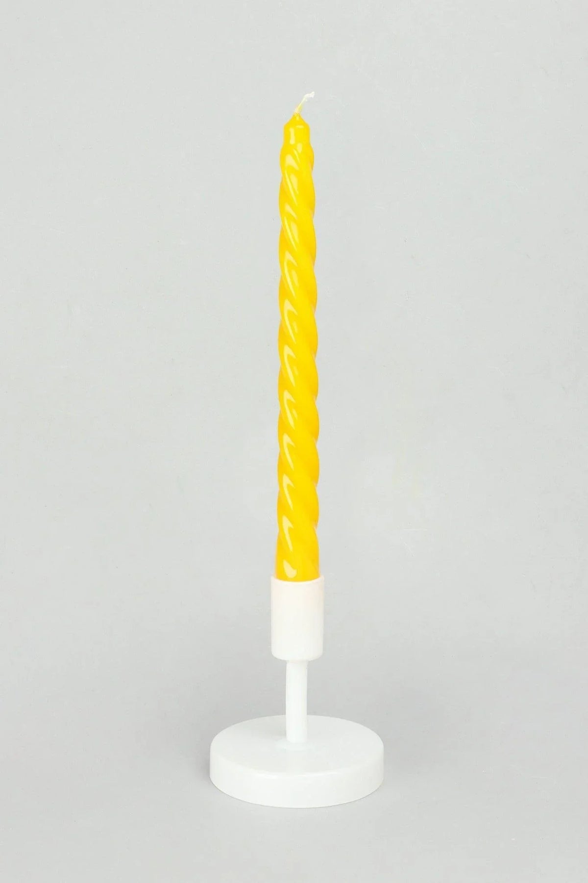 Coraline Solaira Golden Yellow Twisted Taper Candles — close-up view, G Decor