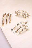 D handle in polished, aged and satin brass, third view