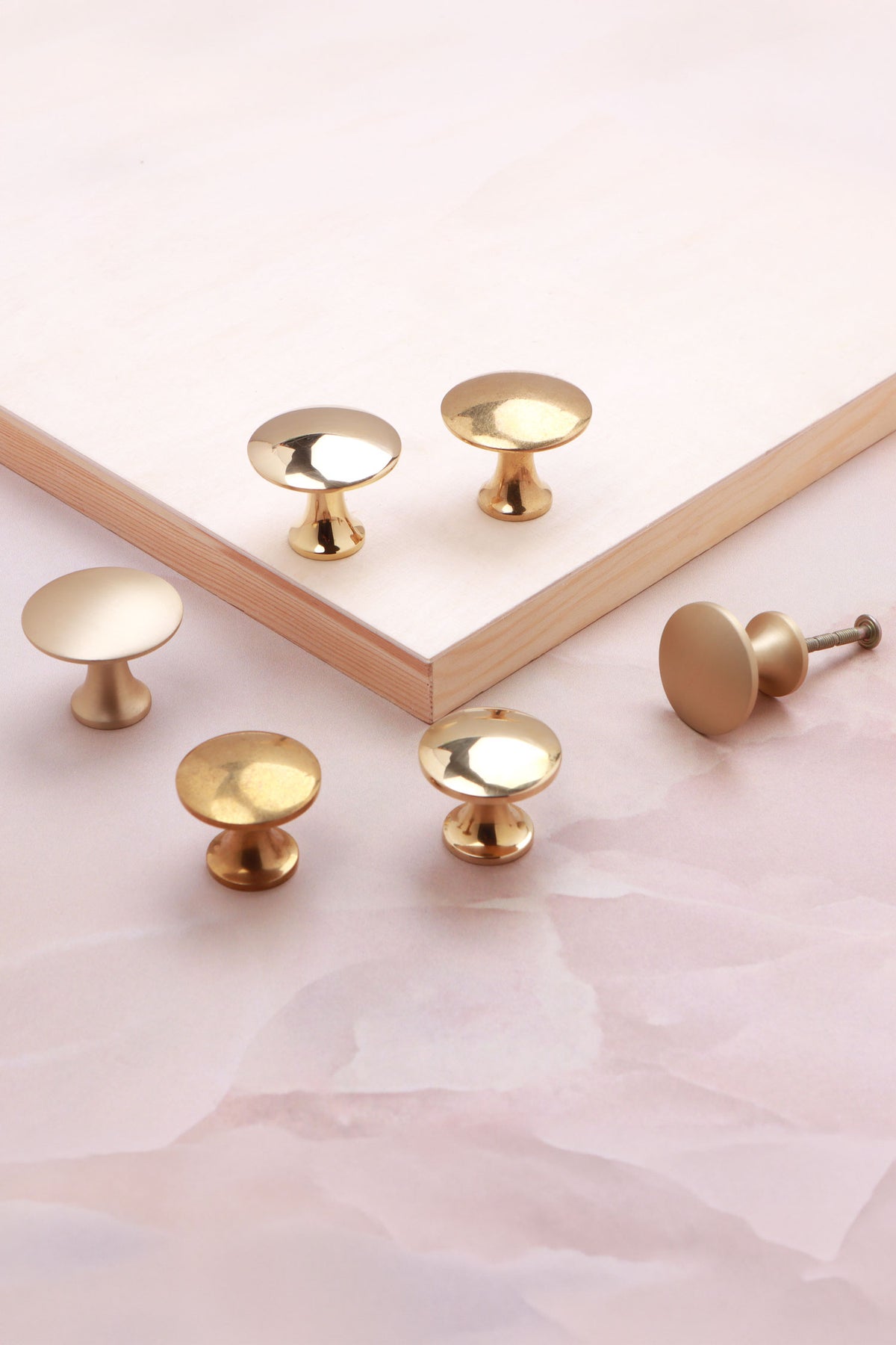 Flat top cabinet knob in polished, aged and satin brass, third view