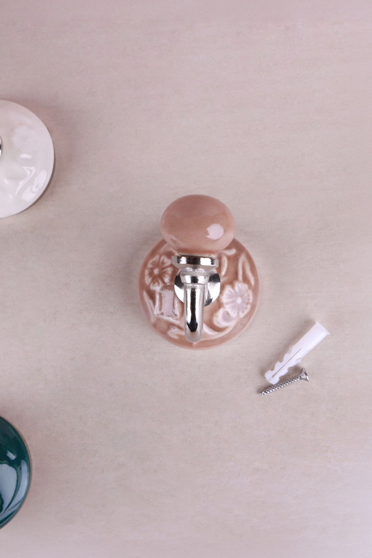 Dusky pink floral ceramic wall hook with a chrome hook