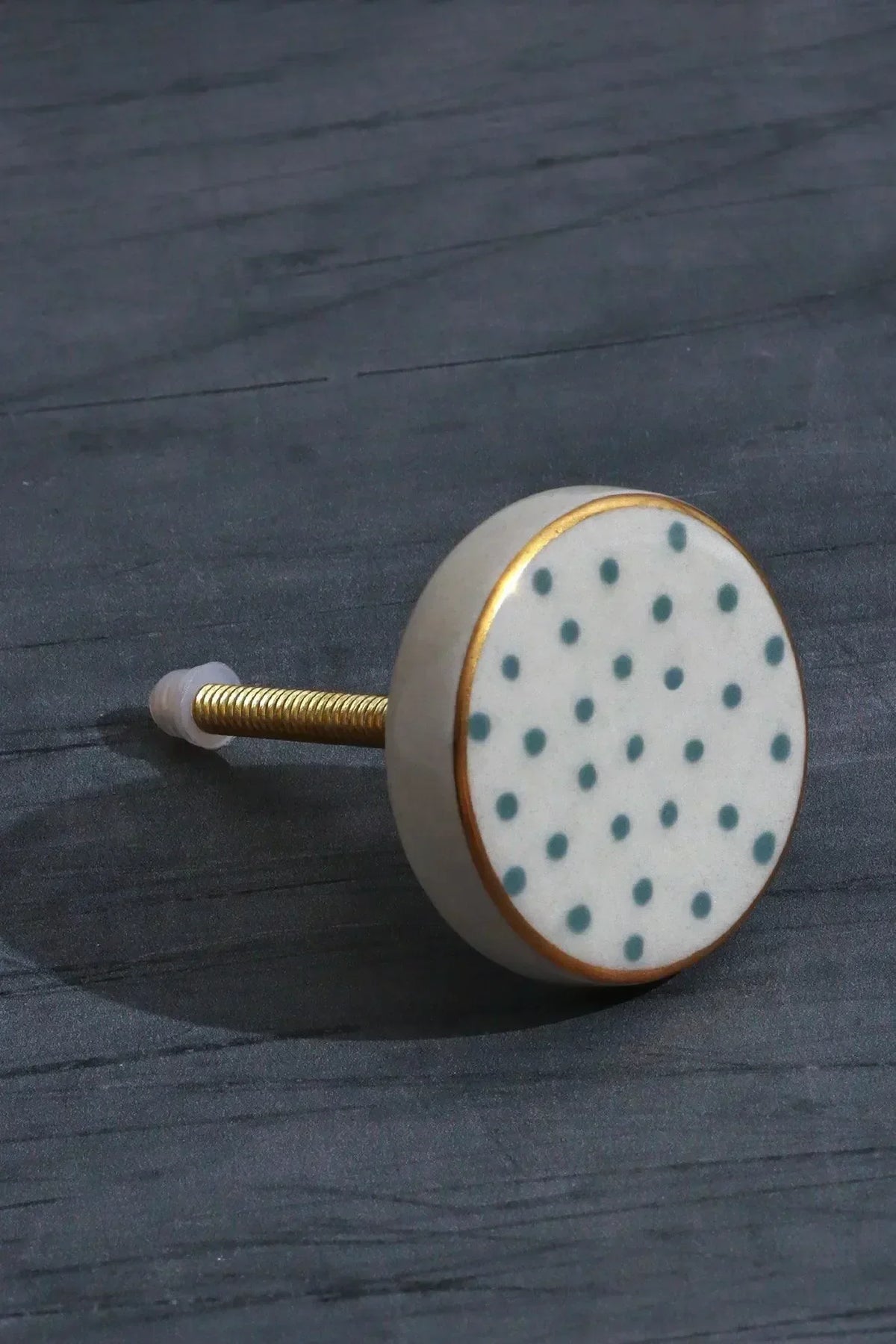 Geometric and polka-dot ceramic knobs styled together — hand-painted, G Decor