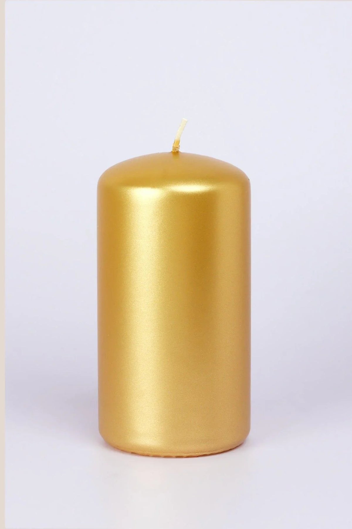Grace Alouette Gold Lacquered Pillar and Ball Candles — close-up view, G Decor