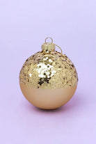 Hand-painted sequin and crackle gold Christmas baubles close-up — G Decor
