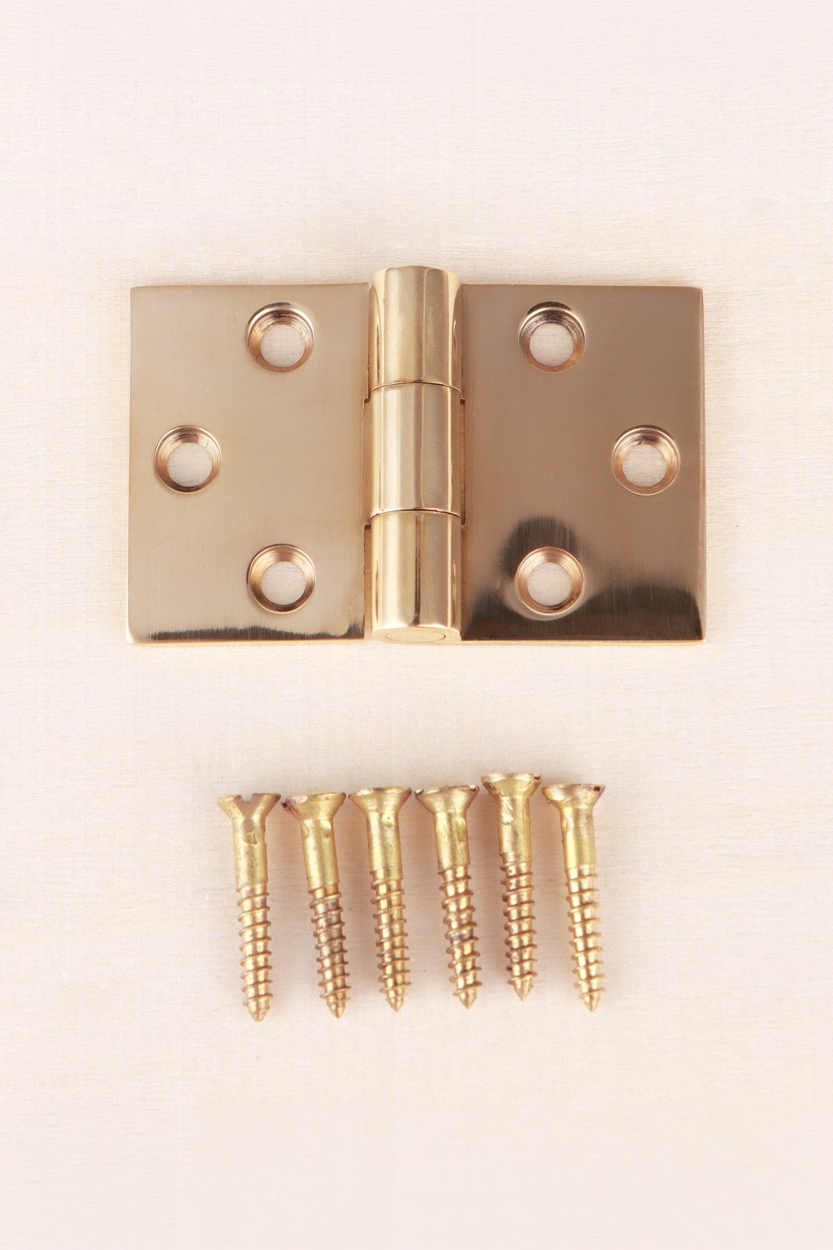 Backflap hinge in polished brass