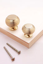 Beehive cabinet knob in polished brass