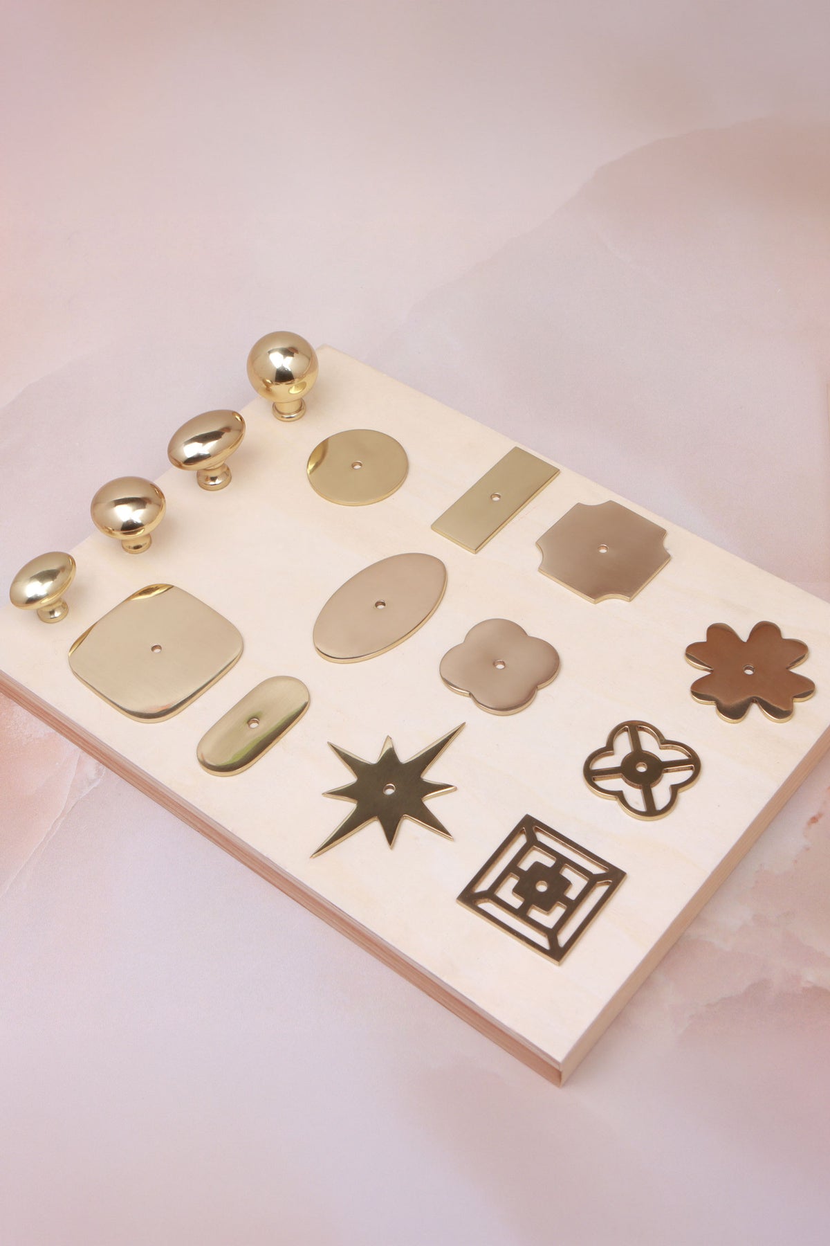 Cabinet knobs and backplates in polished brass, fourth view