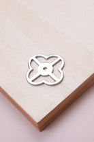 Polished chrome pierced backplate, 38 x 38mm, an open quatrefoil: chrome-plated solid brass with a 4mm centre hole for the knob bolt