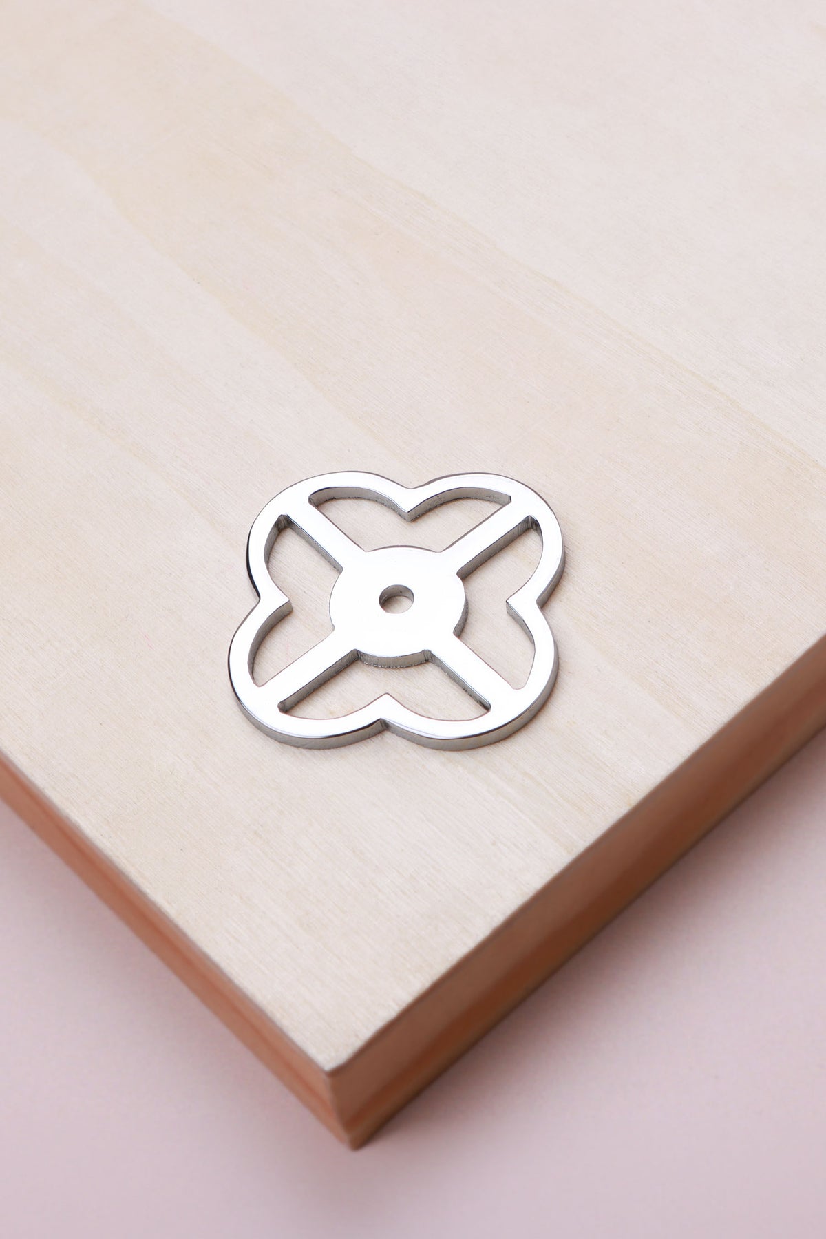 Polished chrome pierced backplate, 38 x 38mm, an open quatrefoil: chrome-plated solid brass with a 4mm centre hole for the knob bolt