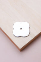 Polished chrome quatrefoil backplate, 42 x 42mm: chrome-plated solid brass with a 4mm centre hole for the knob bolt