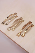 Pull handle in polished, aged and satin brass, third view
