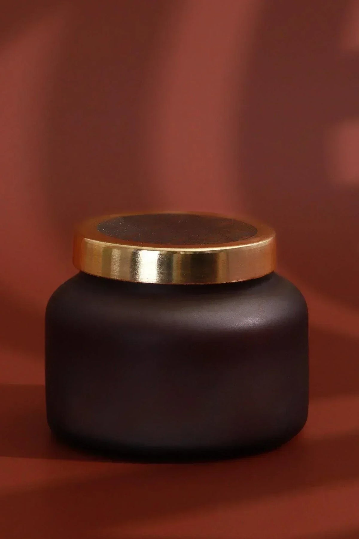 Rasa Nocturne Musk Scented Candle in Frosted Black Glass — close-up view, G Decor