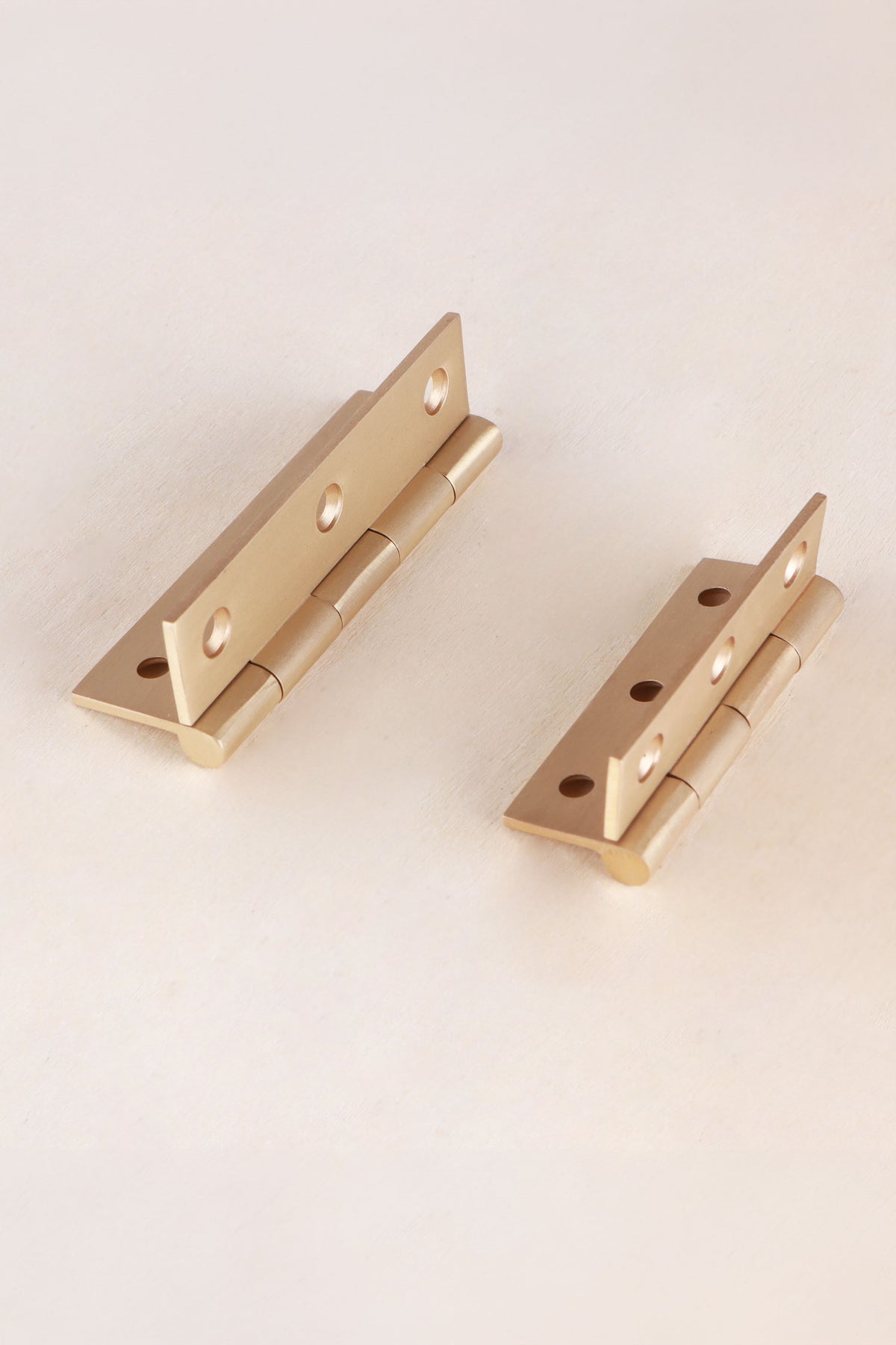 Butt hinge in satin brass, third view