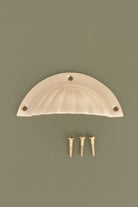 Fluted cup pull in satin brass