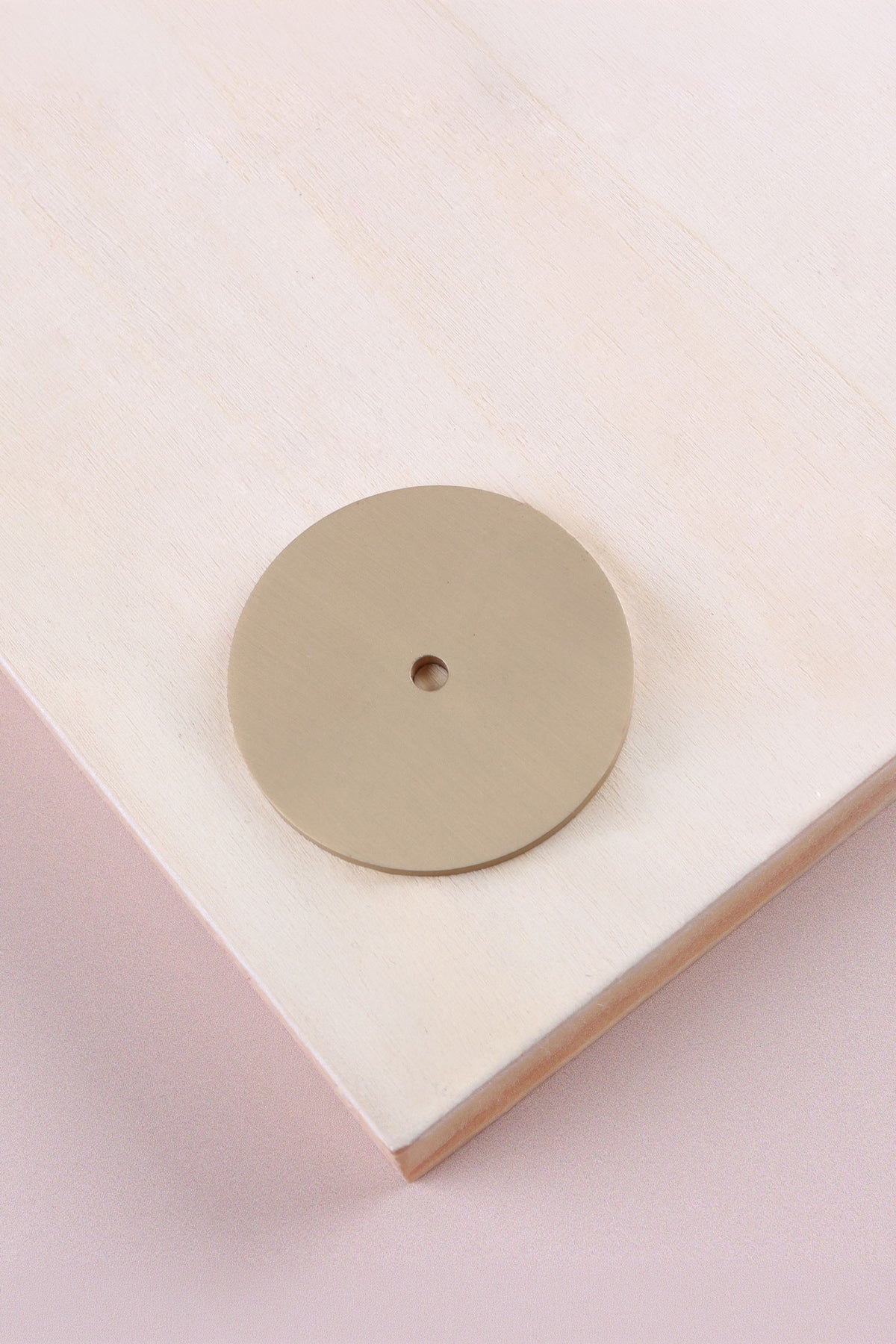 Satin brass round backplate, 45mm across: solid brass with a 4mm centre hole for the knob bolt