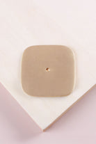 Satin brass squircle backplate, 60 x 60mm with softly rounded sides: solid brass with a 4mm centre hole for the knob bolt