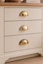 Slim crescent cup pull in polished, aged and satin brass, second view