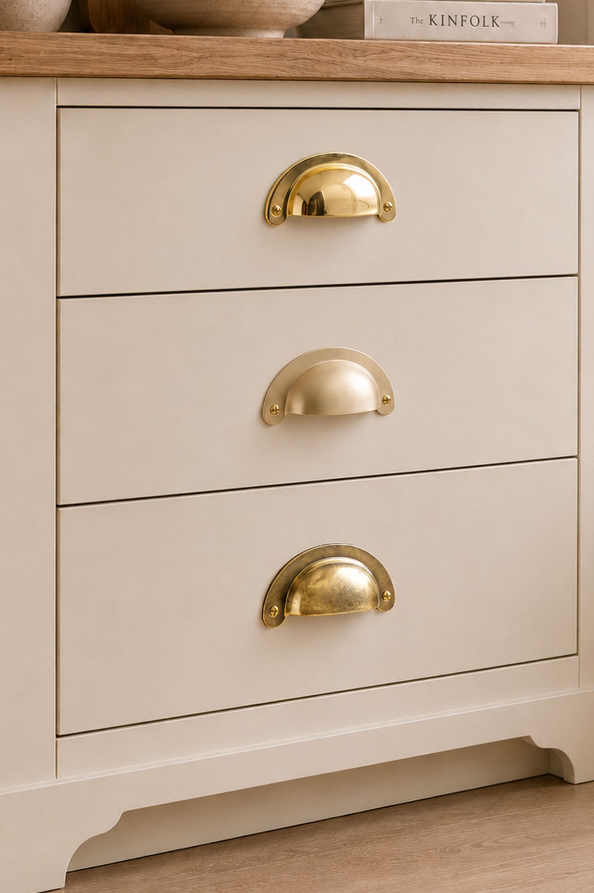 Slim crescent cup pull in polished, aged and satin brass, second view