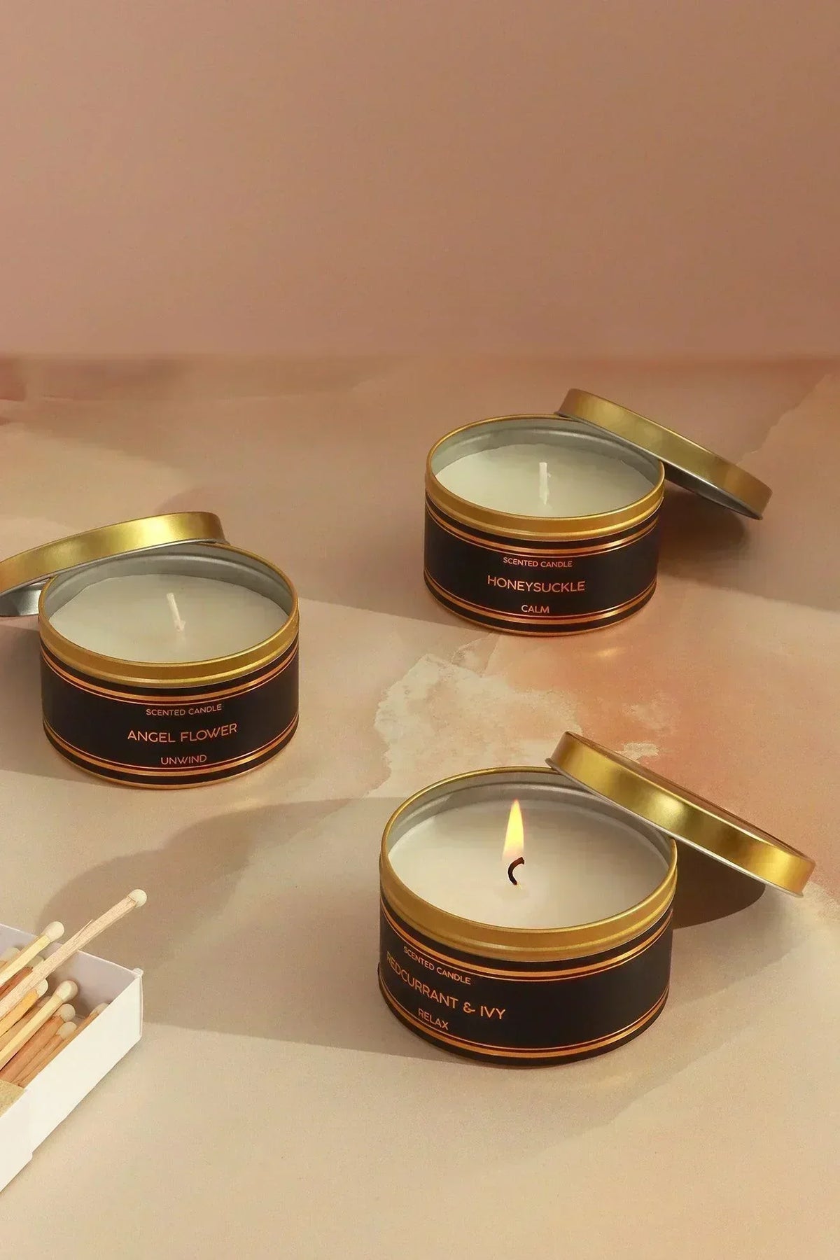 Tranquessence Scented Tin Candle in Black and Gold — G Decor