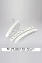 Set of three white wooden accessory hangers: a belt hanger, a scarf hanger with holes and a tie hanger, sold as a box of 8 sets